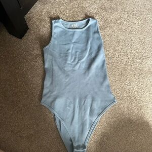 Light blue body suit